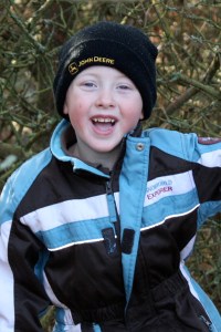 Samuel climbing trees