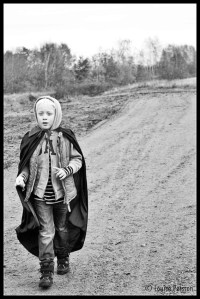 Dracula on dirt road with hood